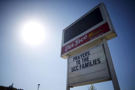 A Del Taco restaurant sign offers support to the families of the Umpqua Community College shooting victims in Roseburg, Oregon, United States, October 2, 2015. REUTERS/Lucy Nicholson