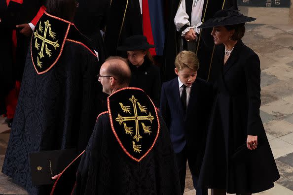 LONDON, ENGLAND - SEPTEMBER 19: Catherine, Princess of Wales, Princess Charlotte and Prince George arrive for the State Funeral of Queen Elizabeth II at Westminster Abbey on September 19, 2022 in London, England.  Elizabeth Alexandra Mary Windsor was born in Bruton Street, Mayfair, London on 21 April 1926. She married Prince Philip in 1947 and ascended the throne of the United Kingdom and Commonwealth on 6 February 1952 after the death of her Father, King George VI. Queen Elizabeth II died at Balmoral Castle in Scotland on September 8, 2022, and is succeeded by her eldest son, King Charles III. (Photo by Phil Noble - WPA Pool/Getty Images)