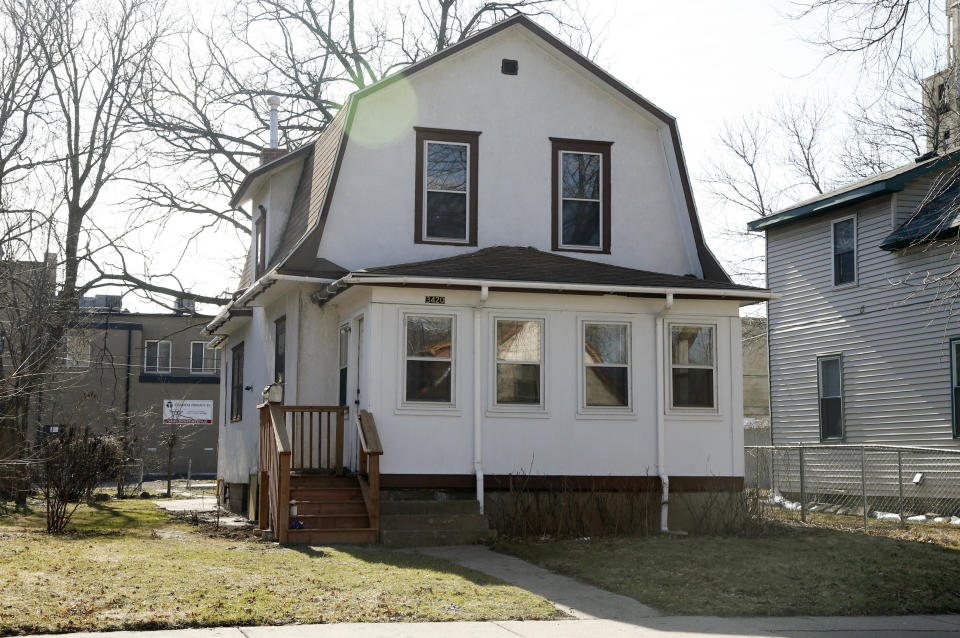 In this April 1, 2017 photo, this house pictured in Minneapolis was used for exteriors of "The Kid" house in Prince's film "Purple Rain." The one-year anniversary of Prince's death from an overdose will be marked April 21. (AP Photo/Jim Mone)