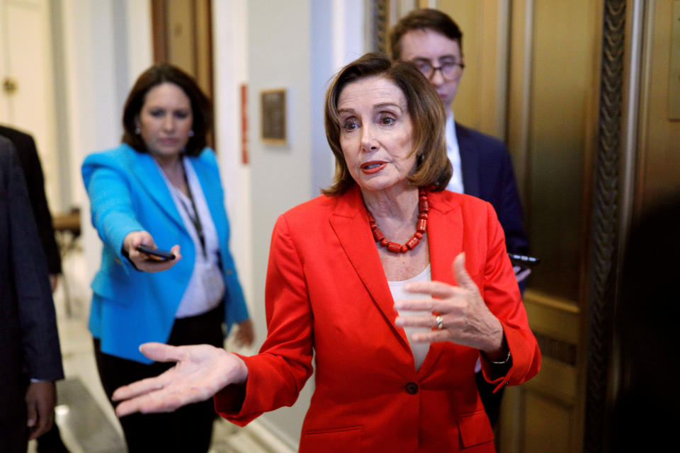 Speaker of the House Pelosi speaks to news reporters ahead of a vote on the coronavirus relief bill on Capitol Hill in Washington