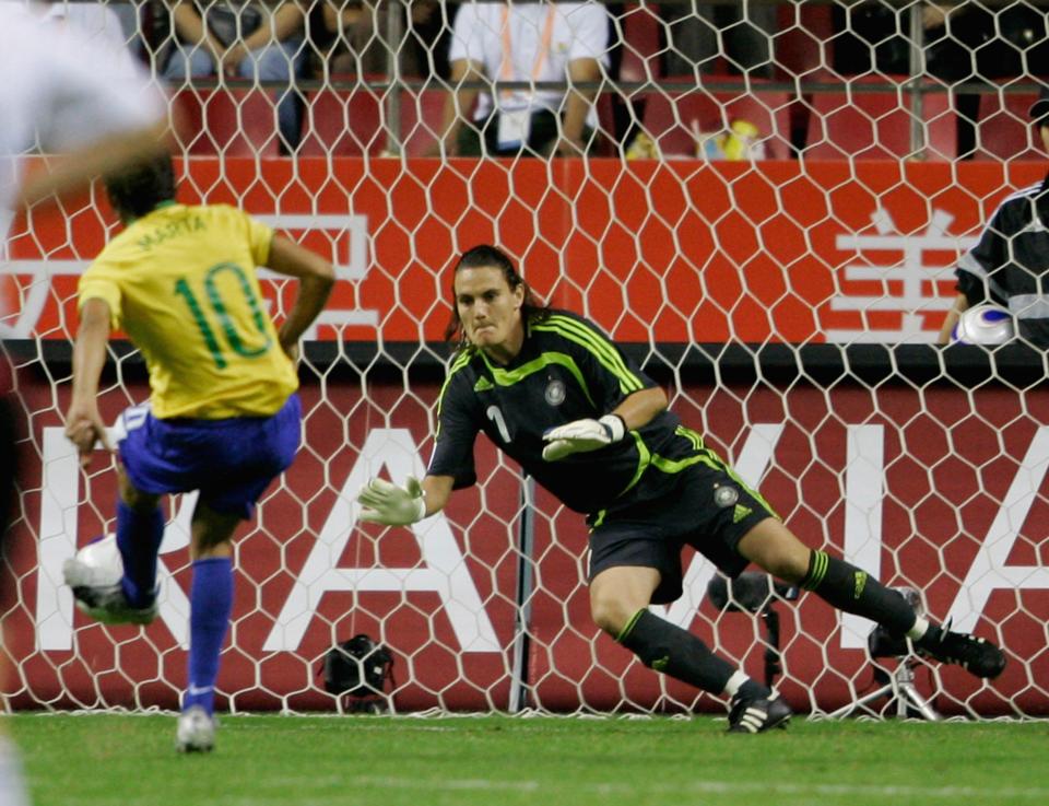 Nadine Angerer of Germany saves a penalty from Marta in the 2007 World Cup final. (Photo by Christof Koepsel/Bongarts/Getty Images)