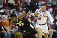 Purdue's Jaden Ivey (23) and Indiana's Parker Stewart (45) battle for the ball during the second half of an NCAA college basketball game, Thursday, Jan. 20, 2022, in Bloomington, Ind. (AP Photo/Darron Cummings)