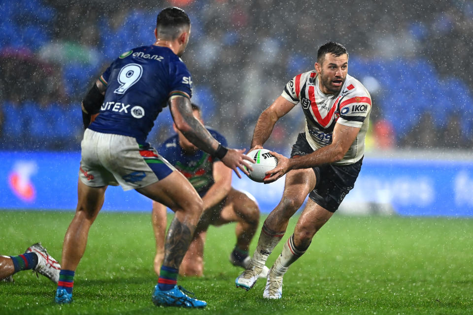 James Tedesco (pictured) runs the ball.