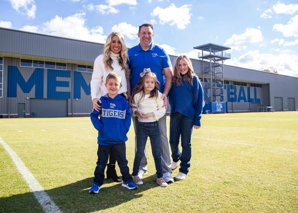 Memphis senior offensive consultant Joshua Eargle and his wife Kristen and their children Stallings, Landrey and Kourtney at Memphis practice facility Wednesday, Nov. 17, 2021.