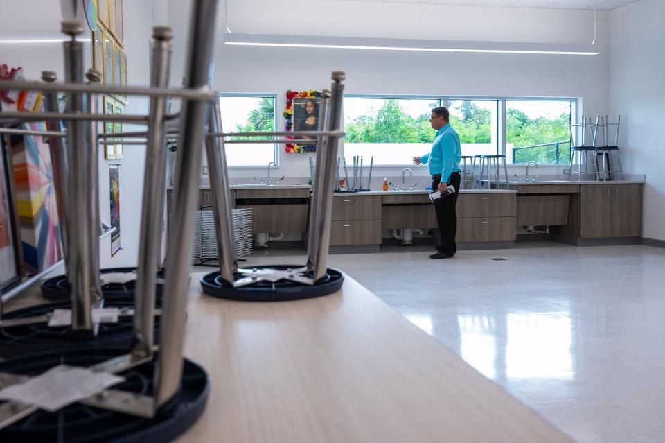 Blue Lake Elementary School Principal Seth Moldovan look over an art classroom.