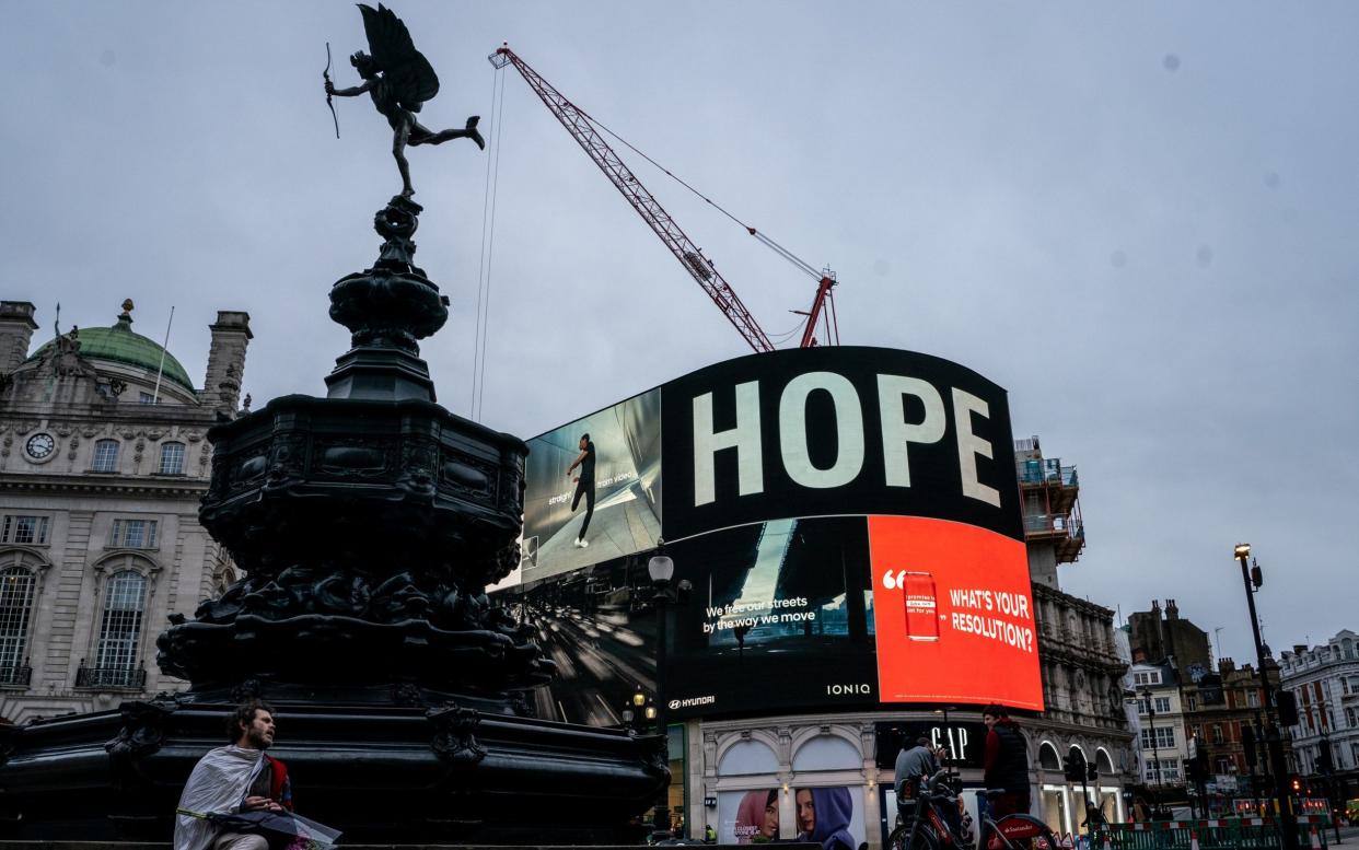 Jeff Moore's famous piccadilly circus displays a message from HSBC bank using the word hope. - Jeff Moore 