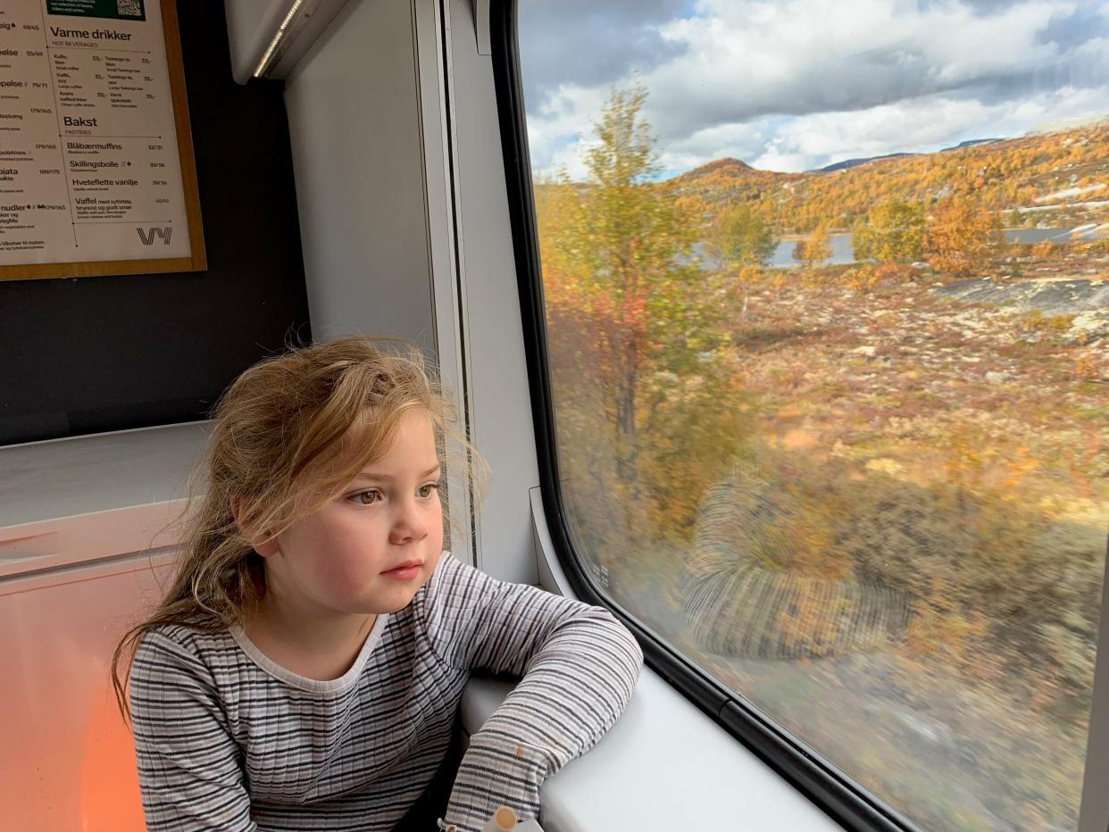 Girl looking out the window