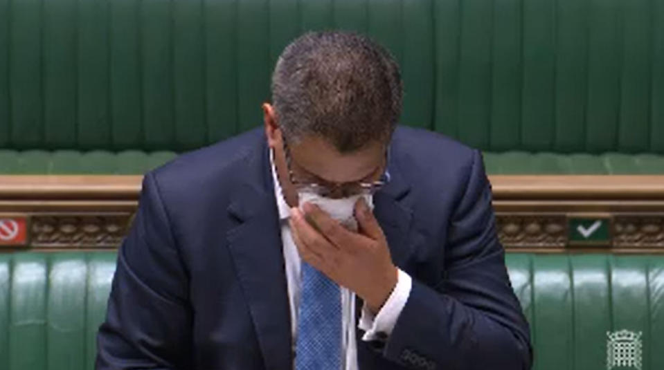 Business Secretary Alok Sharma wipes his face during a speech in the House of Commons, London. Sharma has been tested for coronavirus after becoming visibly unwell in the debating chamber. (Photo by House of Commons/PA Images via Getty Images)