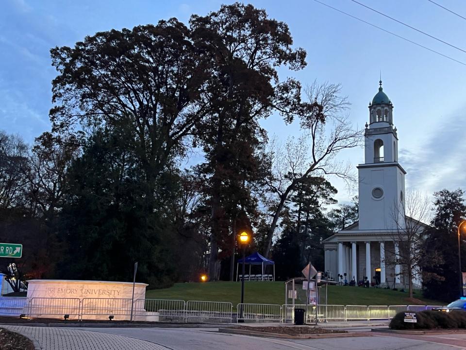 Roads were shut down around Glenn Memorial on the campus of Emory University at 6 a.m. when the Secret Service began their security sweep ahead of Rosalynn Carter's service.