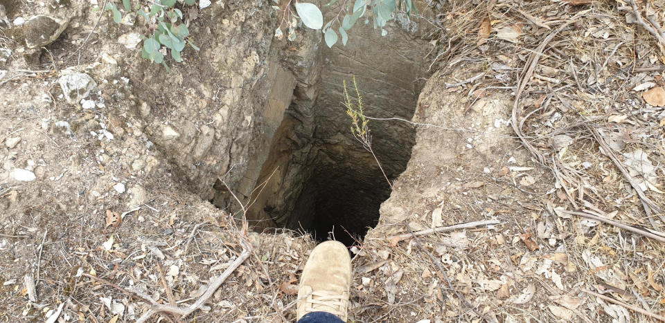 The top of the mineshaft at Vaughan, Victoria. A gold prospector heard noises coming from the shaft and investigated.