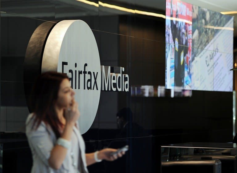 A woman is pictured at the lobby of Fairfax Media's Sydney office on June 18, 2012. Fairfax, which has newspaper, radio and digital interests, is the main rival in Australia to News Limited, Rupert Murdoch's Australian empire