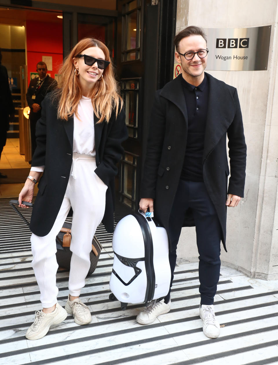Strictly Come Dancing finalists Stacey Dooley and Kevin Clifton leave BBC Broadcasting House in London after appearing on the Chris Evans radio show.