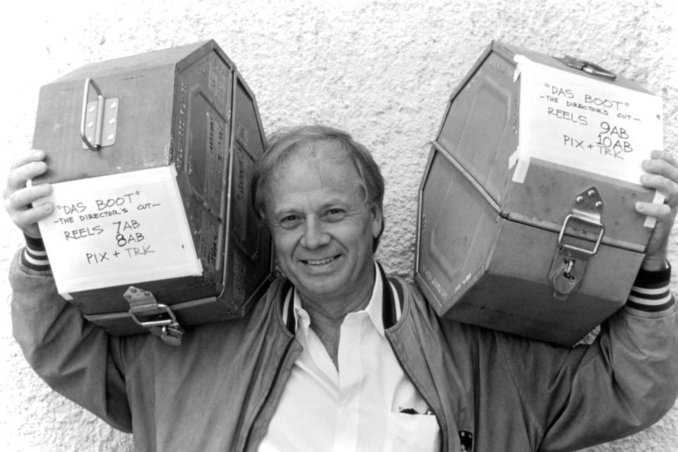 Director Wolfgang Petersen holds up his directors cut of the movie "Das Boot " , circa 1997.