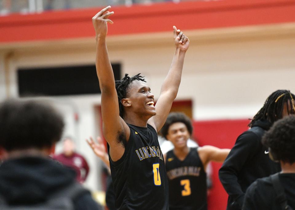 The Lincoln Park Leopards celebrate their win against Uniontown, Monday at Charleroi High School.