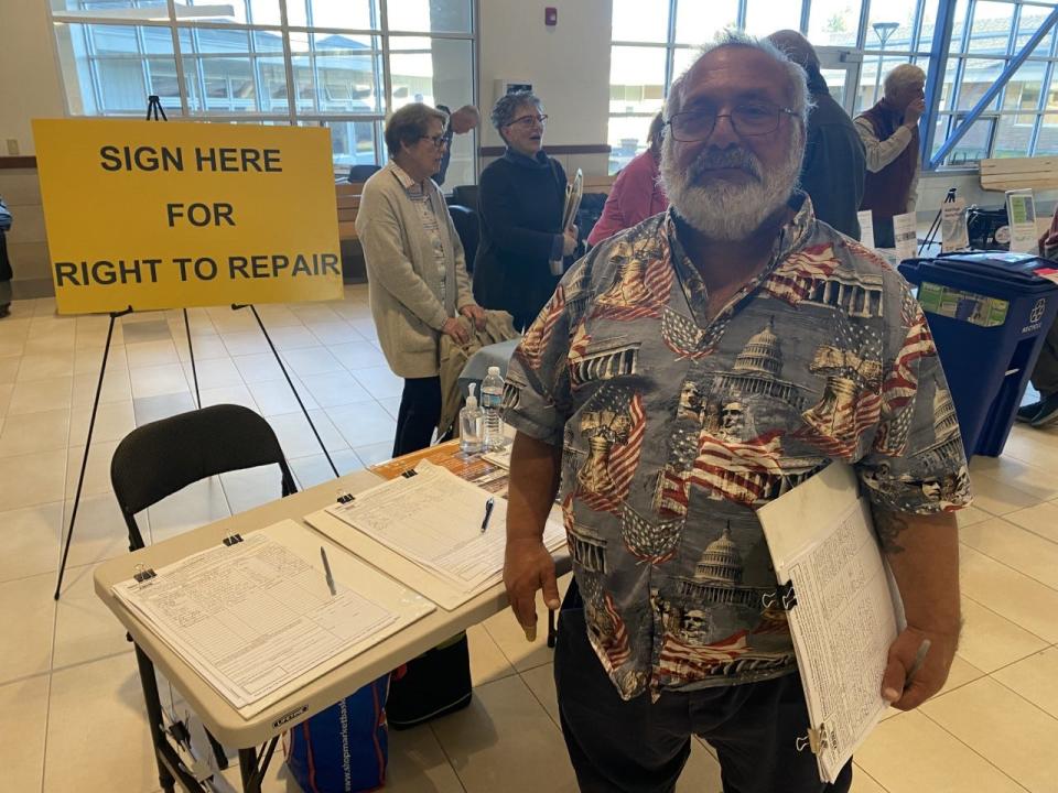 Russell Greenberg volunteers for Maine People’s Alliance at the polls in York collecting signatures for petitions supporting the Right to Repair and paid family leave initiatives.