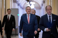 FILE - House Minority Leader Kevin McCarthy, R-Calif., who is hoping to become the next speaker of the House in the new Republican majority, leaves the chamber after railing against the massive $1.7 trillion spending bill that finances federal agencies and provides aid to Ukraine, at the Capitol in Washington, Friday, Dec. 23, 2022. (AP Photo/J. Scott Applewhite, File)