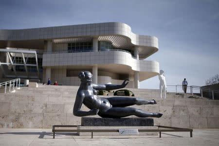 FILE PHOTO: People walk around the Getty Center art museum and tourist landmark in Los Angeles, California, U.S. on March 27, 2016. REUTERS/Lucy Nicholson/File Photo FOR EDITORIAL USE ONLY.