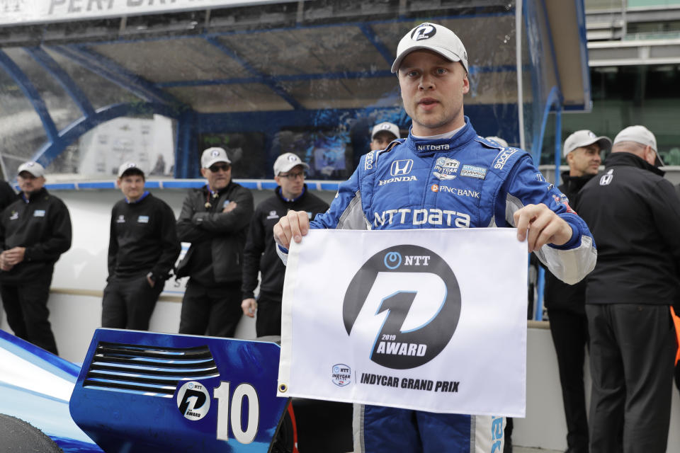 Felix Rosenqvist, of Sweden, celebrates after winning the pole for the Indy GP IndyCar auto race at Indianapolis Motor Speedway, Friday, May 10, 2019 in Indianapolis. (AP Photo/Darron Cummings)
