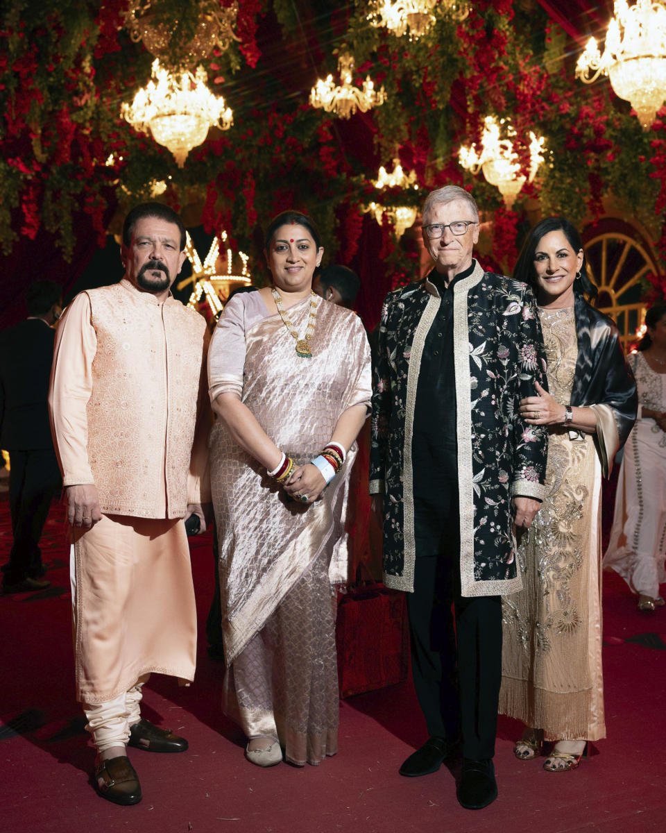 This photograph released by the Reliance group shows R to L Paula Hurd, Bill Gates, Indian Minister of Women and Child Development Smriti Irani and her husband Zubin Irani at a pre-wedding bash of Mukesh Ambani's son Anant Ambani in Jamnagar, India, Saturday, Mar. 02, 2024. (Reliance group via AP)
