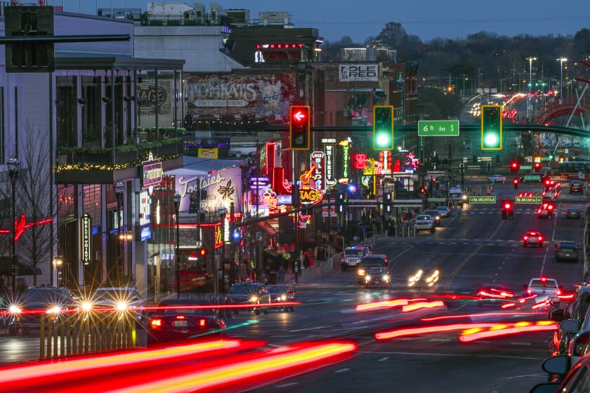 Nashville, TN - December 08: A night view of Broadway on Wednesday, Dec. 8, 2021 in Nashville, TN. (Irfan Khan / Los Angeles Times)