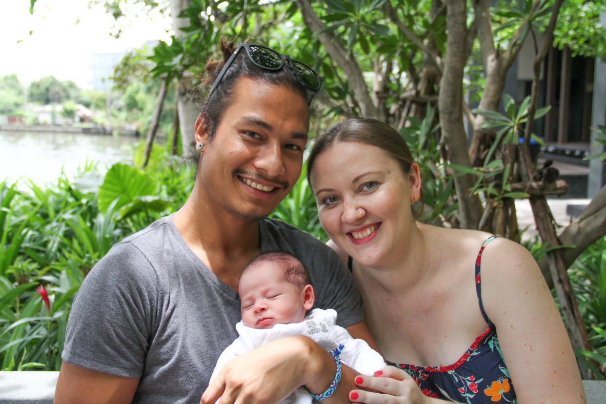 The three of us at our temporary home in Bangkok just a few days after my daughter's birth. (Photo: Photo Courtesy of Elen Turner)