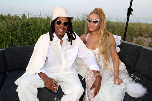 <p>Michael Rubin</p> Beyoncé and Jay-Z pose for photos at Michael Rubin's star-studded white party.