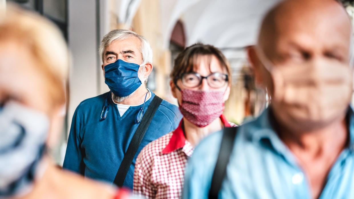 <p>Vaccinated Americans no longer need to wear masks or socially distance</p> (Getty/iStock)