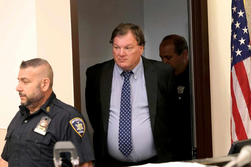 <p>James Carbone/Newsday via AP, Pool</p> Rex Heuermann enters the courtrrom for a hearing at Suffolk County Court in Riverhead, N.Y. on June 6, 2024.