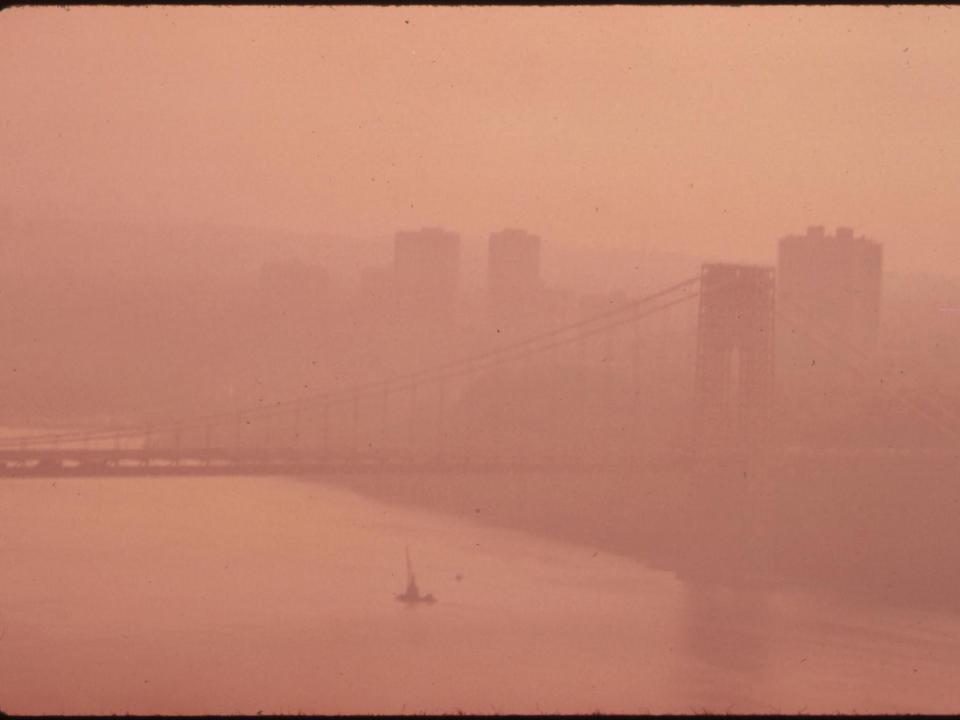 The George Washington Bridge in Heavy Smog. View toward the New Jersey Side of the Hudson River.