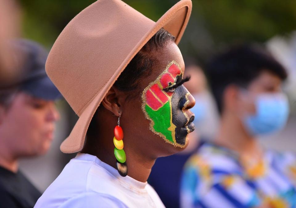 Protesters marched from John B. White, Sr. Blvd., through Spartanburg, Friday evening, June 19 2020. The crowd marched in celebration of Juneteenth.