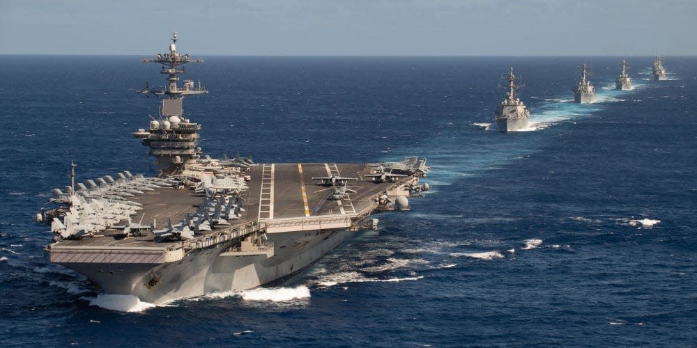 The Theodore Roosevelt Carrier Strike Group transits in formation Jan. 25, 2020. The Theodore Roosevelt Carrier Strike Group is on a scheduled deployment to the Indo-Pacific.