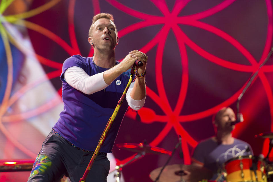 FILE - Chris Martin of Coldplay performs at Metlife Stadium on Aug. 1, 2017, in East Rutherford, N.J. Coldplay's latest album, “Music of the Spheres,” releases Oct. 15. (Photo by Scott Roth/Invision/AP, File)