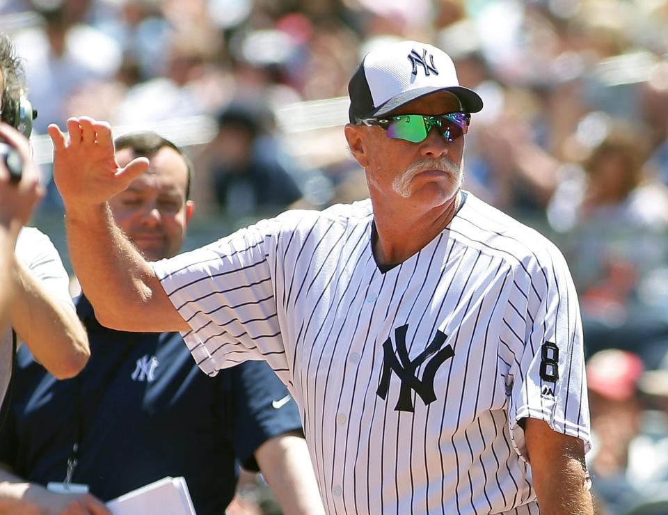 Former Yankees pitcher Rich "Goose" Gossage waves to the fans during the Old Timers Day ceremony prior to the game between the Detroit Tigers and New York Yankees at Yankee Stadium.