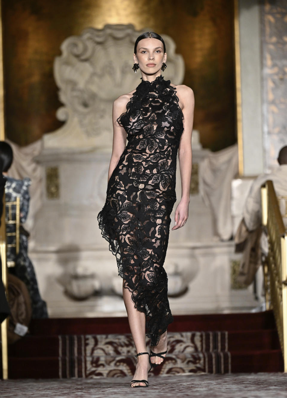 A model walks the runway during the Christian Siriano Fall/Winter 2024 fashion show at The Plaza Hotel during New York Fashion Week on Thursday, Feb. 8, 2024, in New York. (Photo by Evan Agostini/Invision/AP)