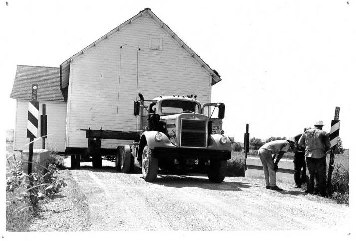 The Alton Schoolhouse is moved to Forest Park Museum in 1964.