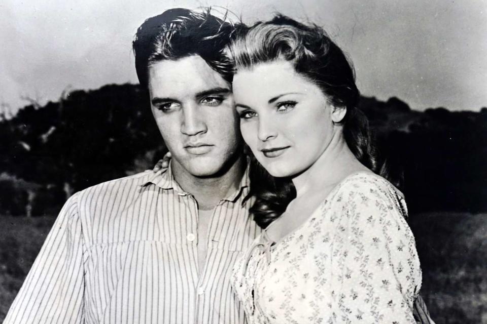 <p>World History Archive / Alamy</p> Elvis Presley and Priscilla Presley