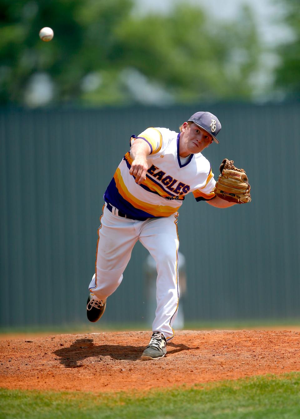 Red Oak's Brex Caldwell throws a pitch during the Class A spring state baseball tournament against Canute.