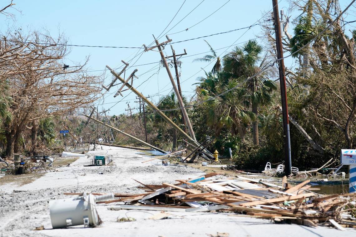 Debris is seen on Sanibel Island, in the aftermath of Hurricane Ian, Friday, Sept. 30, 2022, on Sanibel Island, Fla. (AP Photo/Steve Helber)