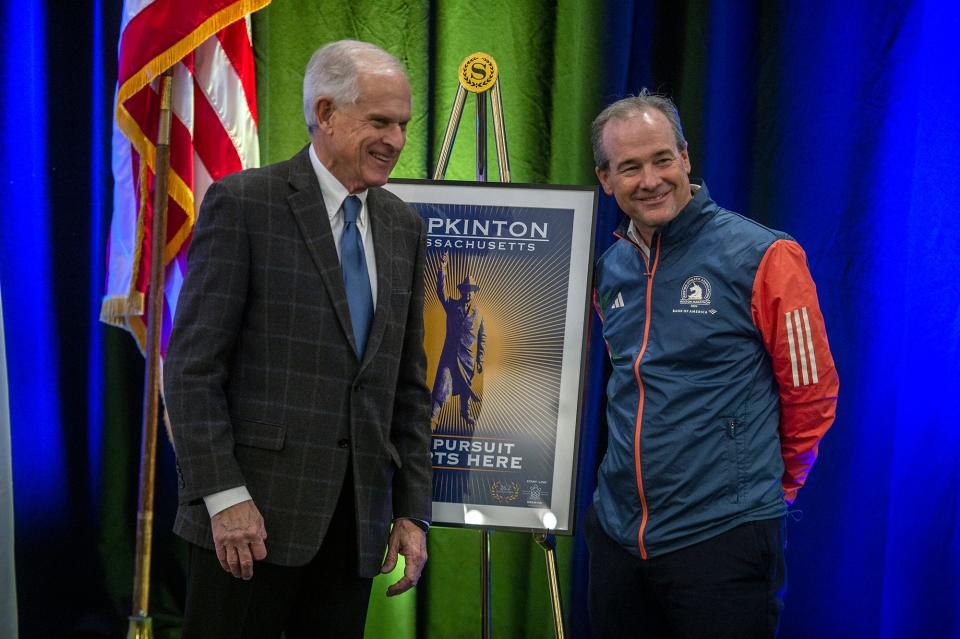 Tim Kilduff, left, president of the Hopkinton-based 26.2 Foundation, and Jack Fleming, president and CEO of the Boston Athletic Association, pose for a photo during the MetroWest YMCA Marathon Community Breakfast and Annual Campaign Kick-off, March 14, 2024. This year marks the 100th in which the Marathon starts in Hopkinton.