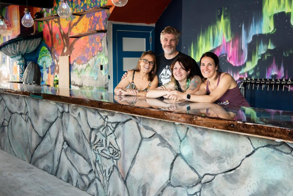 From left: Alice Krier, Joe Winiarski, Flopy D'Amelio and Angie Winiarski, pose for a photo behind the bar at Mystic Ways Brewing Co. in Perkasie on Thursday, August 4, 2022, two days before their grand opening.