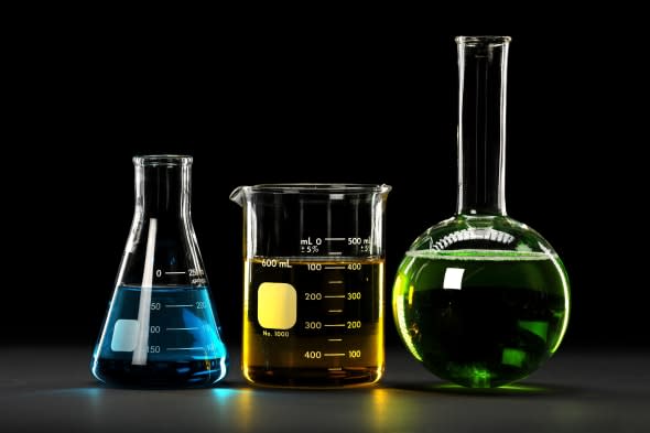 BXT8DK Laboratory glassware with liquids of different colors  laboratory; glassware; research; science; medical; test; medicine;
