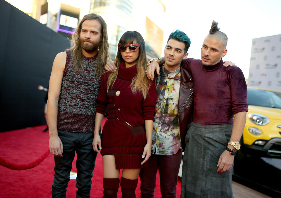 LOS ANGELES, CA - NOVEMBER 22: (L-R) Recording artists Jack Lawless, JinJoo Lee, Joe Jonas and Cole Whittle of music group DNCE attend the 2015 American Music Awards at Microsoft Theater on November 22, 2015 in Los Angeles, California. (Photo by Mike Windle/AMA2015/Getty Images for dcp)