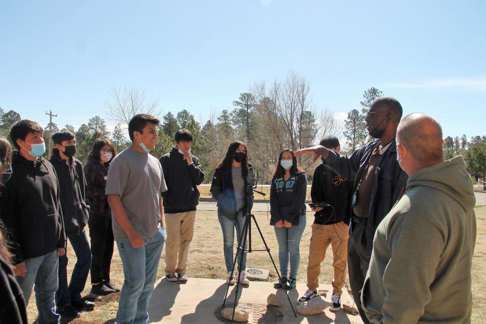 Mescalero Apache High School Biology teacher Nate Raynor leads his class in a discussion about air temperatures and polluntants during a class on April 4, 2022.