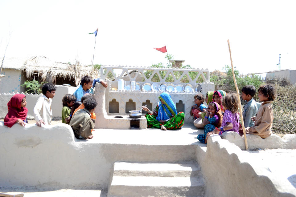 Villagers use a stove on a raised platform, designed by Lari<span class="copyright">Heritage Foundation of Pakistan</span>