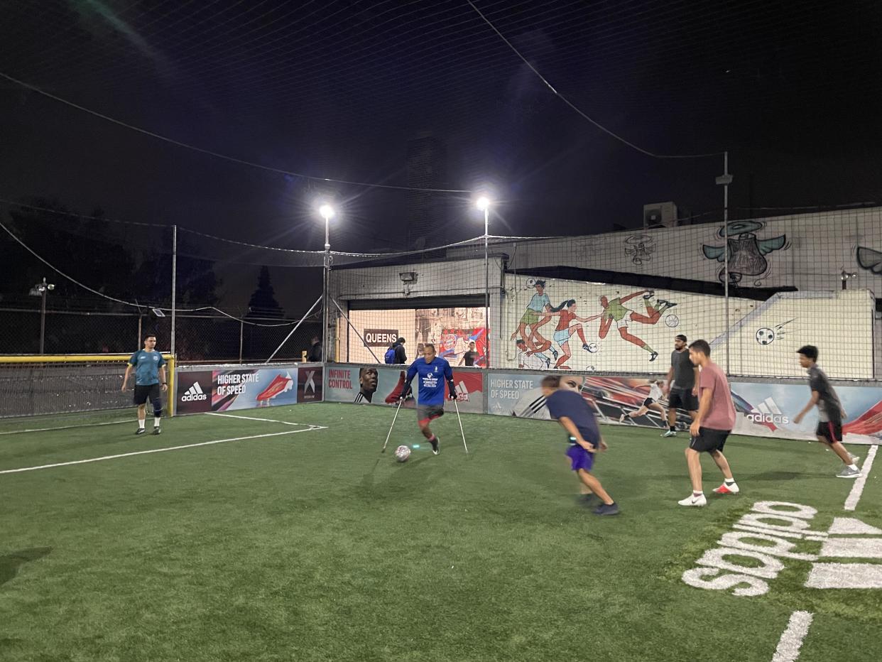 Juan Vargas plays soccer with other Venezuelan migrants, many of whom are also living in homeless shelters or repurposed hotels across New York City. / Credit: Camilo Montoya-Galvez