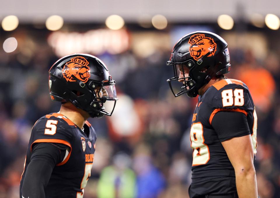 Oregon State Beavers quarterback DJ Uiagalelei (5) and tight end Jack Velling (88) celebrate a touchdown during the second half of the game against the UCLA Bruins on Saturday, Oct. 14, 2023 at Reser Stadium in Corvallis, Ore.