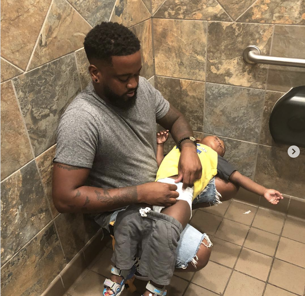 Florida dad Donte Palmer started the "Squat for Change" movement to demand diaper-changing stations in public men's rooms. (Screenshot: 3boys_1goal/Instagram)  