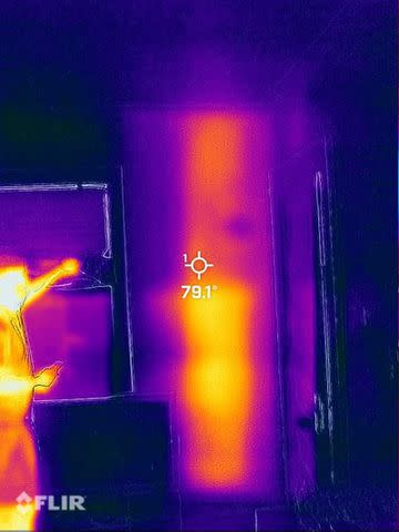 <p>Courtesy of Ashley Massis Class</p> Thermal camera shows bee hive behind wall