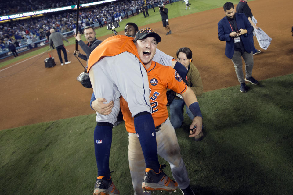 <p>Jose Altuve #27 and Alex Bregman #2 of the Houston Astros celebrate on the field after the Astros defeated the Los Angeles Dodgers in Game 7 of the 2017 World Series at Dodger Stadium on Wednesday, November 1, 2017 in Los Angeles, California. (Photo by Rob Tringali/MLB Photos via Getty Images) </p>