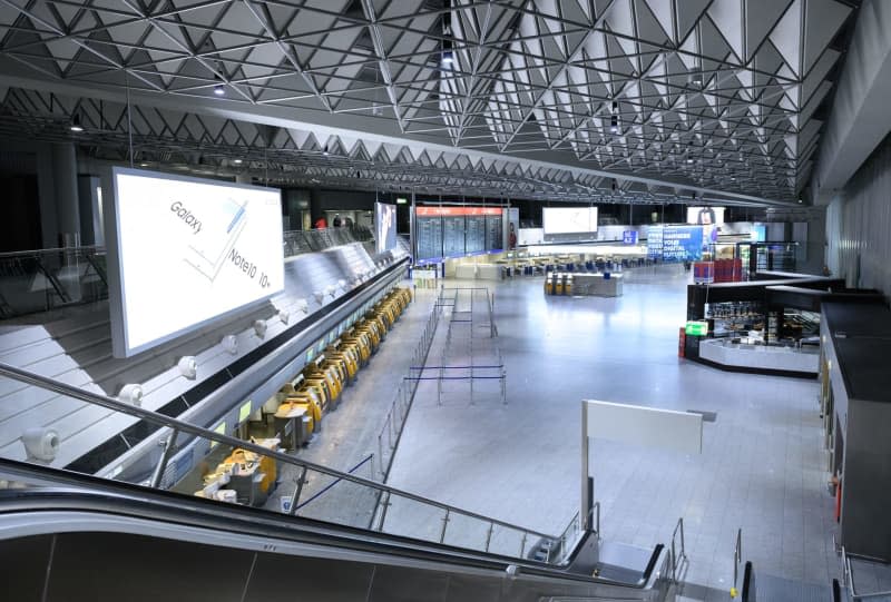 A view of empty Lufthansa check-in counters in Terminal 1 at Frankfurt Airport during a strike by flight attendants. Frankfurt airport to be closed for departing passengers during strike. Silas Stein/dpa